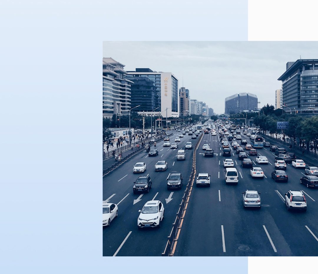 Heavy city traffic on a multi-lane urban road in Asia, symbolizing the importance of data-driven road safety and sustainable mobility initiatives – part of the FIA Driver Safety Index.